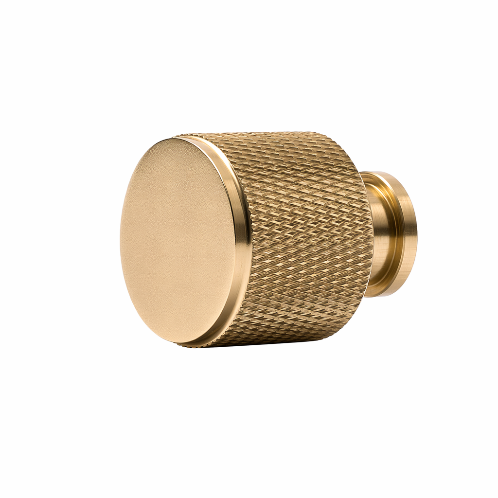 Skåpknopp Jirana i mässing med lättrad kant, 22 mm